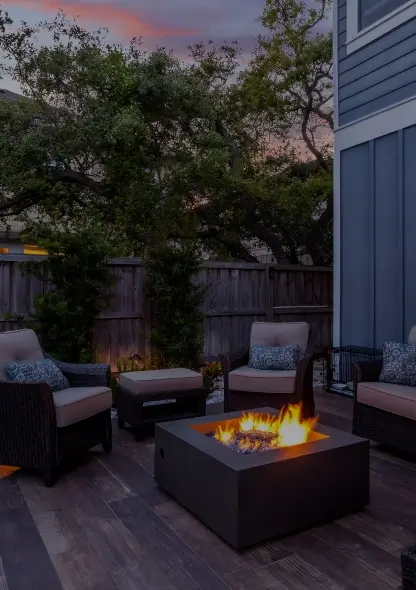 Square outdoor fire pit with seating surrounding it