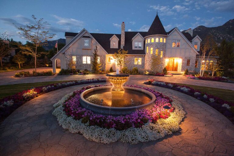 a fountain surrounded by a circular driveway
