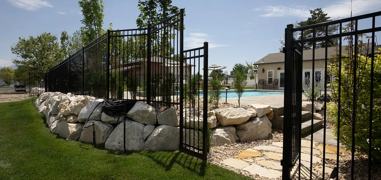 Iron gate that's a part of a yard's landscaping