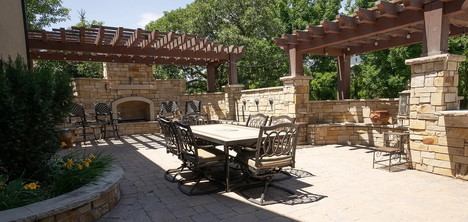 two beautiful pergolas over a paved walkway
