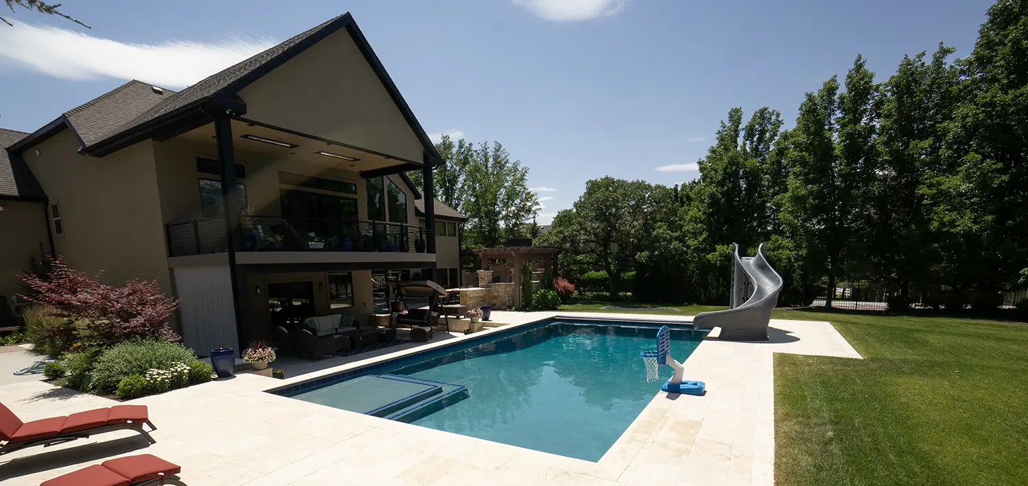 Poolhouse in a Utah backyard with a slide