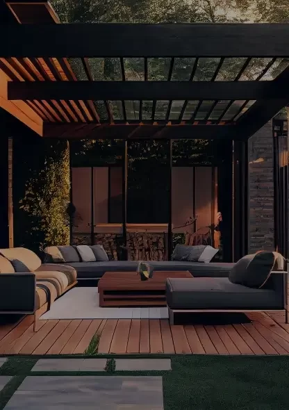 Outdoor deck with a couch and overhead pergola