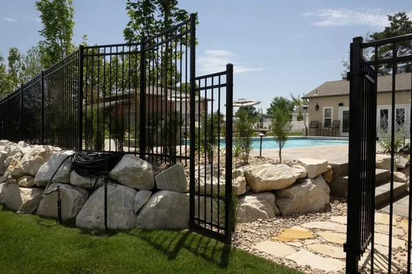 Iron gate that's a part of a yard's landscaping